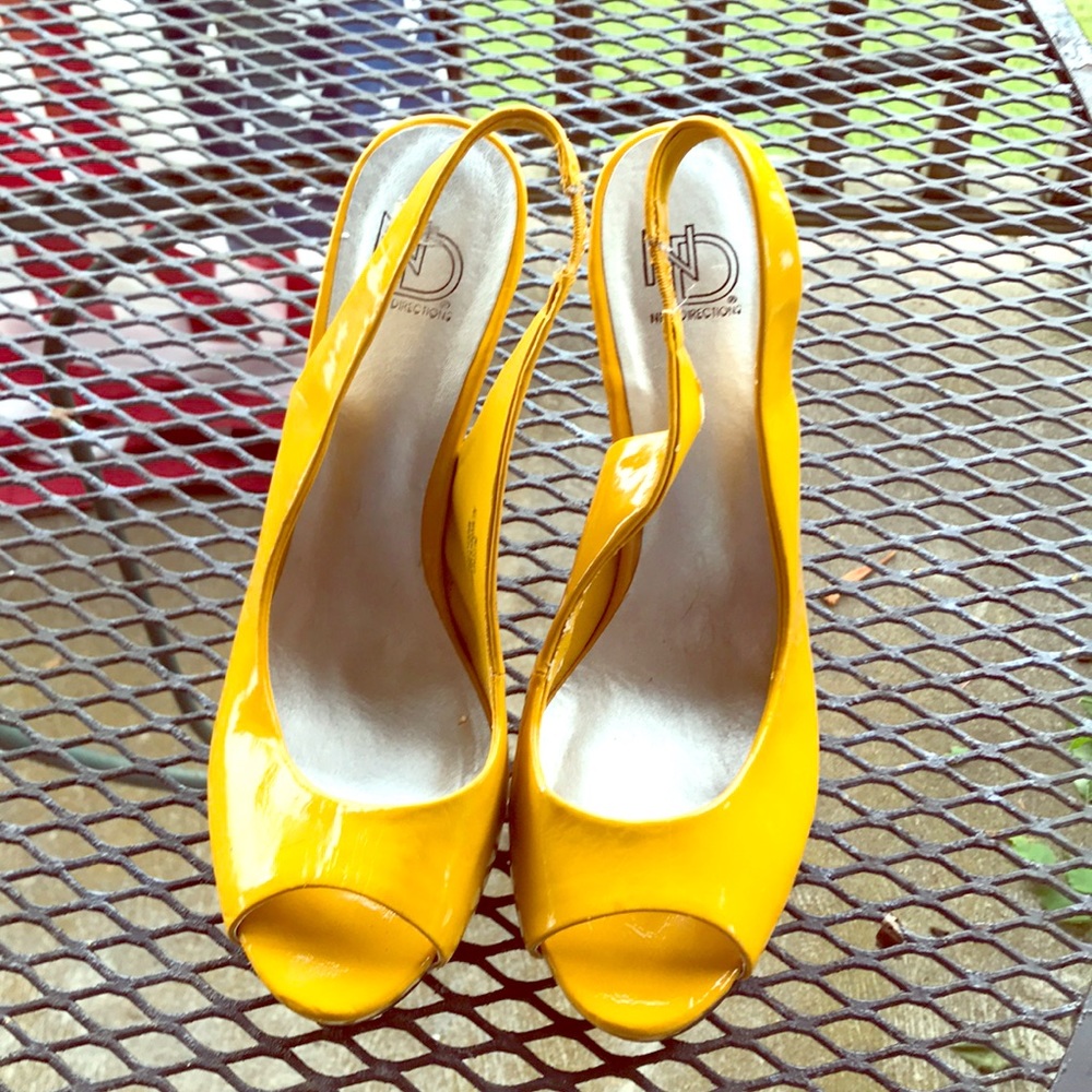 Yellow high heeled dress shoes